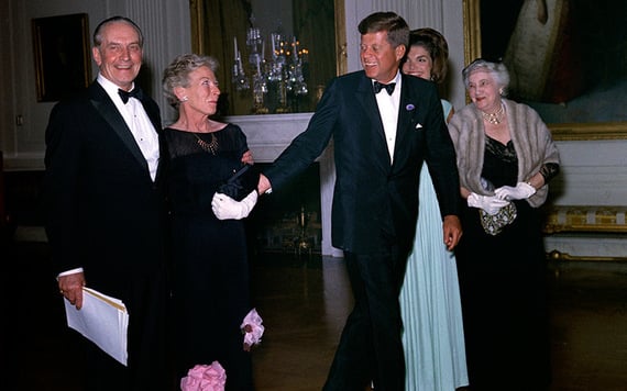 President John F. Kennedy visits with guests in the East Room during a dinner in honor of Nobel Prize winners from the Western Hemisphere. Left to right: actor, Frederic March; writer, Mary Welsh Hemingway (widow of Nobel Prize-winning author, Ernest Hemingway); President Kennedy; First Lady Jacqueline Kennedy; and Katherine Tupper Marshall (widow of Nobel Prize winner and former Secretary of State, General George C. Marshall). White House, Washington, D.C. Image: Robert Knudsen. White House Photographs. John F. Kennedy Presidential Library and Museum.