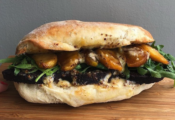 Black pudding sandwich with caramelized apple and Cashel blue cheese.