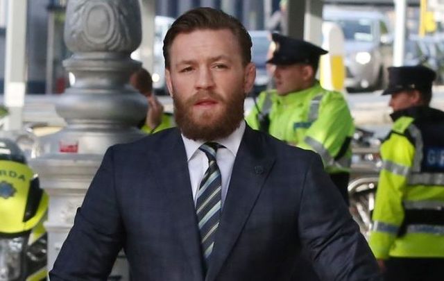 Conor McGregor appeared at Dublin District Court on October 11 after being filmed punching a man in April.