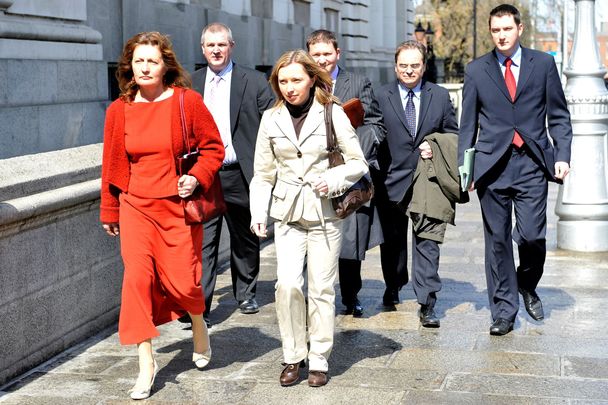 April 24, 2008: (L-R) Widow of murdered solicitor Pat Finucane, Geraldine, brother of Pat Finucane, Dermot, daughter Katherine (front) son Michael (back) their solicitor Peter Madden who founded his solicitors firm with Pat in 1979 and son John, pictured outside Government Buildings on their way into talks with the Government. 