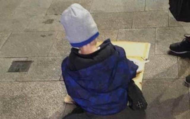 This photo of a homeless five-year-old Irish boy, \"Sam,\" eating his dinner off a piece of cardboard in Dublin has sparked outrage.
