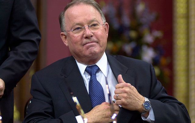 Bernard Landry replaces his pen after signing the papers to officially become the new Premier of the Canadian province of Quebec March 8, 2001, during a ceremony at the National Assembly in Quebec City.