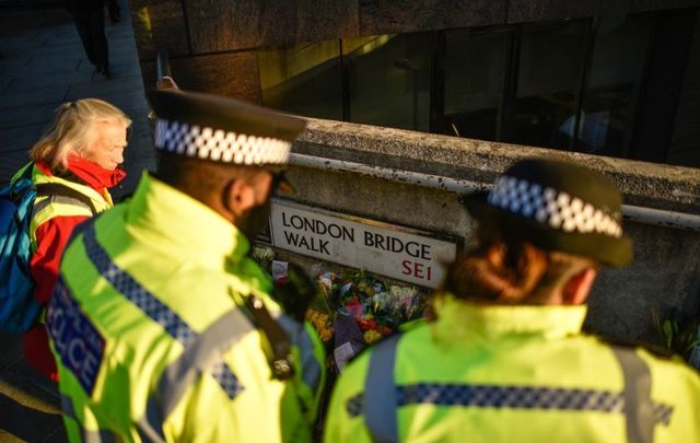 Floral tributes are left for Jack Merritt and Saskia Jones, who were killed in a terror attack, on December 2, 2019, in London, England. 