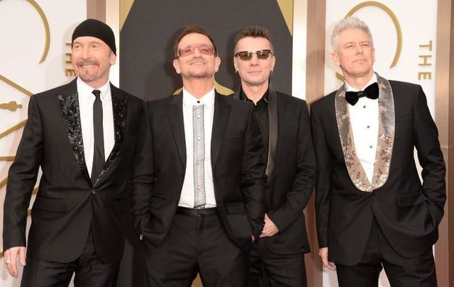 U2 photographed at the 2019 Oscars. 