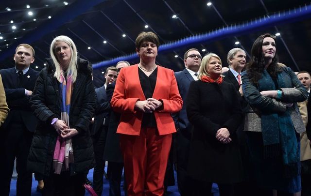 DUP leader Arlene Foster watches on as Sinn Fein candidate John Finucane is declared the winner of the north Belfast seat over DUP candidate Nigel Dodds in the Belfast count center at the Titanic Exhibition center on December 13, 2019, in Belfast, United Kingdom. 