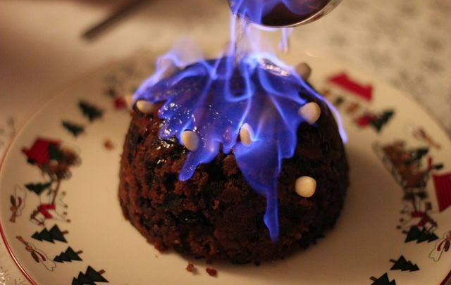 Christmas pudding aflame.