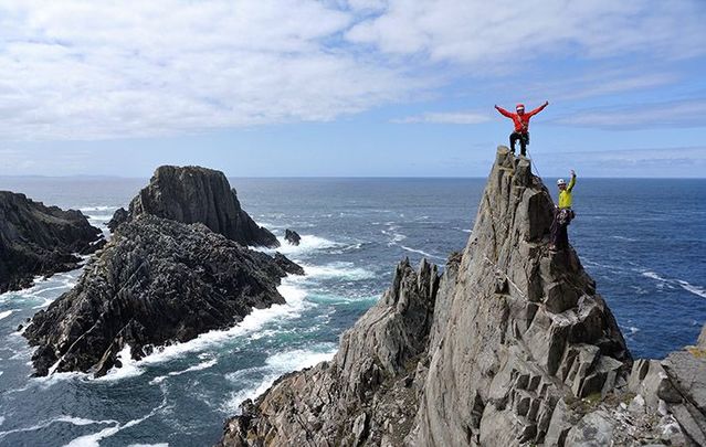 Rock-climbers at Malin Head, Donegal, along the Wild Atlantic Way.