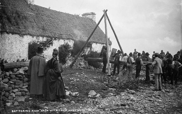 A battering ram used by the RIC to breach a farmer\'s home. Photo inscribed with the words \"Back with them, away with them.\"