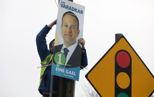 Putting up Taoiseach and Fine Gael leader Leo Varadkar posters in his constituency in Dublin on the day he announces he is to seek dissolution of the 32nd Dáil for a general election. 