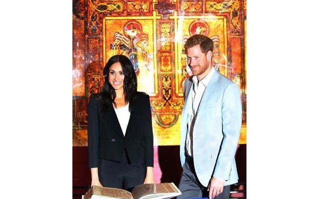 Megan Markle and Prince Harry during their visit to the Book of Kells, at Trinity College in Dublin.