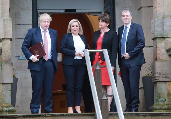 British Prime Minister Michelle O\'Neill, Sinn Fein leader Michelle O\'Neill, Democratic Unionist Party leader Arlene Foster and the UK Northern Ireland Secretary Julian Smith.