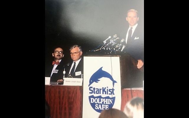 Then-Senator Joe Biden speaking at a press conference in support of dolphin-safe legislation in 1990, with Ted Smyth pictured far left.