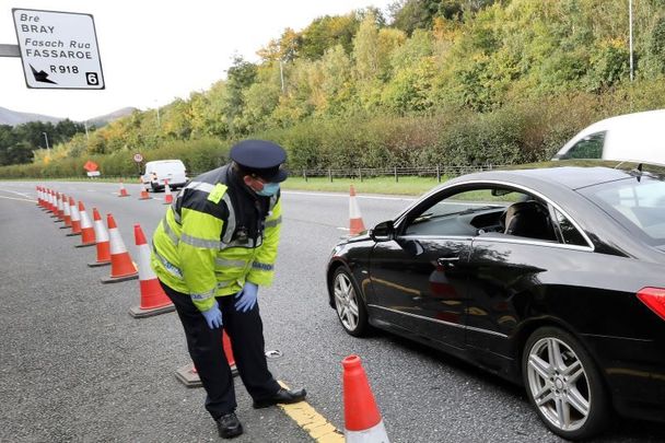 October 7, 2020: Gardai speaking to commuters at a checkpoint on the M11 near Bray as part of Operation Fanacht.