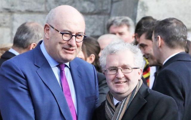 Justice Seamus Woulfe (right) pictured with Phil Hogan, who resigned from his role as EU Commissioner for Trade after Golfgate.