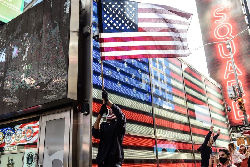 Dancing in the streets, New York City celebrates President-elect Joe Biden