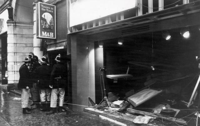 November 22, 1974: Firemen survey the damage outside the Birmingham pub \'Tavern in the Town\'