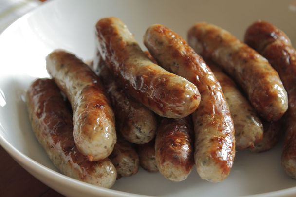 EU and U.K. officials in talks to avoid a potential two-way ban on a wide range of foods including sausages, mincemeat, and prepared meals.