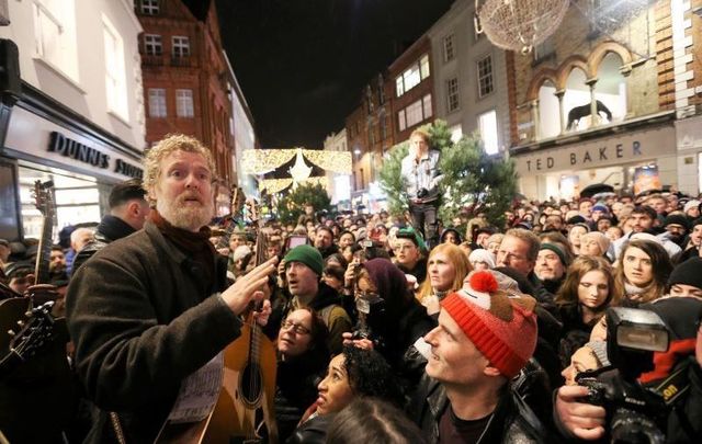 Glen Hansard at the Christmas Eve busk on Grafton Street in Dublin in 2016.
