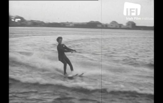 Brr! Mrs. Carr braves the cold waters at Balscadden Bay on Christmas Day, 1961.