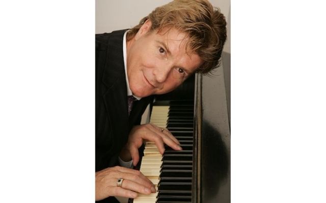 Andy Cooney playing his piano.