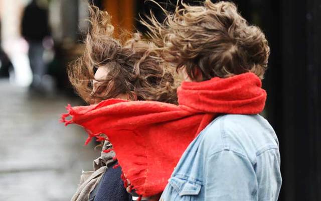 Members of the public experience strong gusts of wind from Storm Dennis, which hit Ireland this weekend.