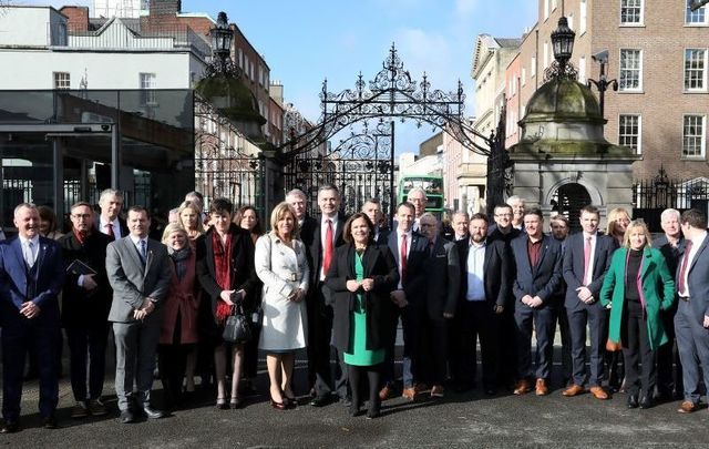  First Day of the 33rd Dail. Sinn Fein President Mary Lou McDonald surrounded by supporters and the media while heading to Leinster House for the first day back as the Dail returns from the elections on February 20, 2020.