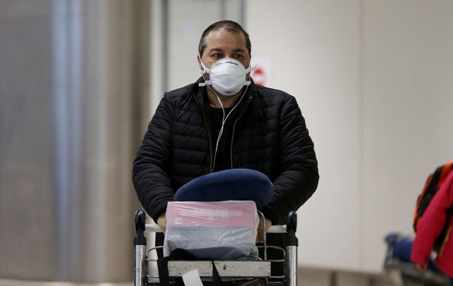 A man wearing a face mask at Dublin Airport.