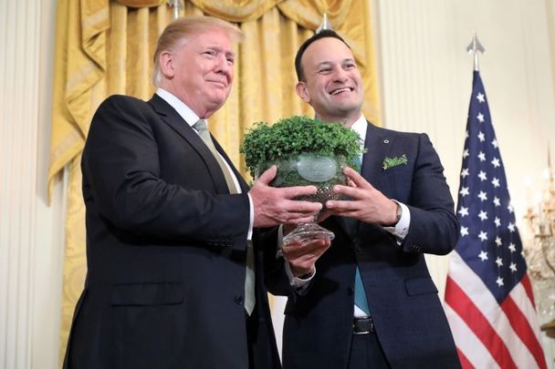 Taoiseach Leo Varadkar presenting President Donald Trump with the traditional bowl of shamrock for St. Patrick\'s Day, in 2019.