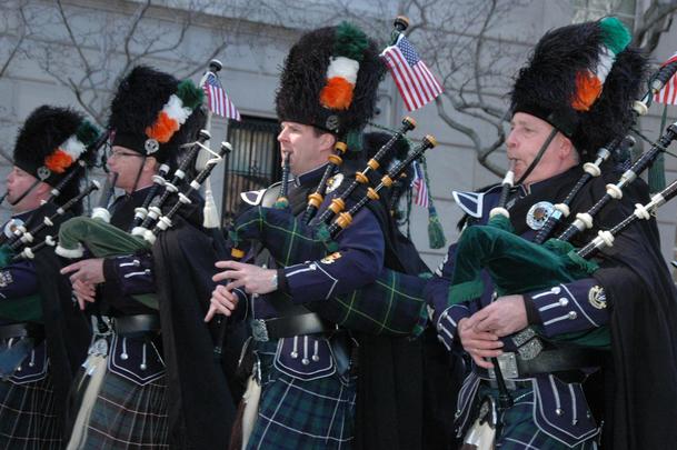 Pipers walking up Fifth Ave, in the New York St. Patrick\'s Day parade. 