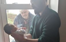 Irish man meets grandson for first time through window during social distancing