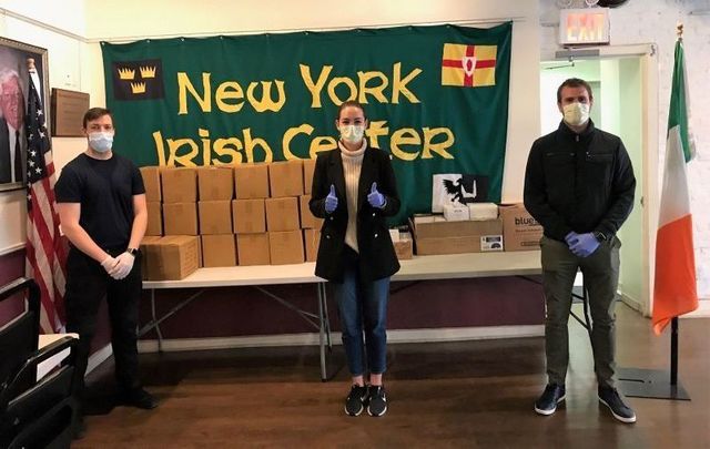 Stephen Long, Sophie Colgan, and Brian Glynn at the New York Irish Center\'s drop off location on Friday, April 3.