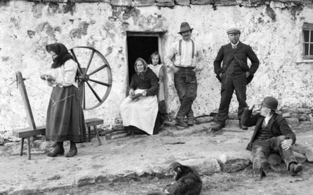 A family photographed outside their house in Ireland, circa 1900.