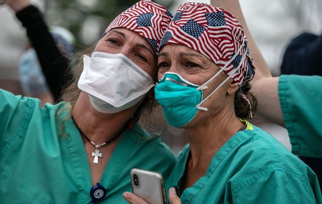 Emotional EMS workers dealing with the onslaught of COVID-19 in New York.