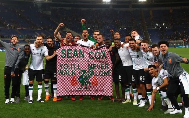 Liverpool players pose with a Sean Cox banner after beating Roma in the Champions League semi-final. 
