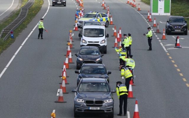 Garda officers enforce lockdown restrictions on the N7. 