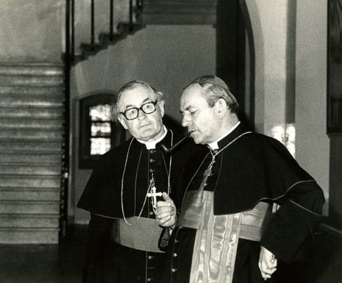 Bishops Kevin McNamara and Cardinal Tomas O Fiaich(R) at a press conference after a Bishops meeting in Maynooth.