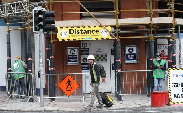 Irish builders return to work, with social distancing.