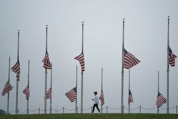 American flags fly at half-staff near the Washington Monument on the National Mall, May 22, 2020 in Washington, DC. 