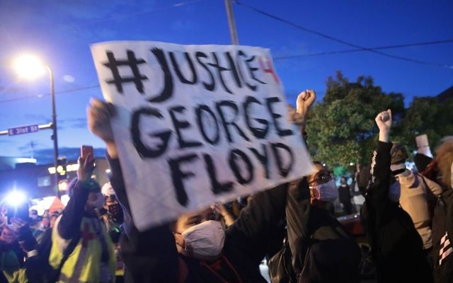 Protestors gather in Minneapolis to demand justice after George Floyd\'s killing. 