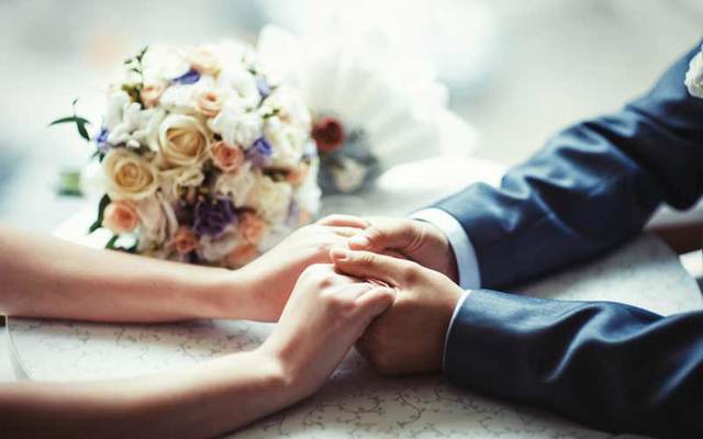An Irish couple\'s nuptials was postponed due to COVID-19, but not before they got matching tattoos with the original wedding date.