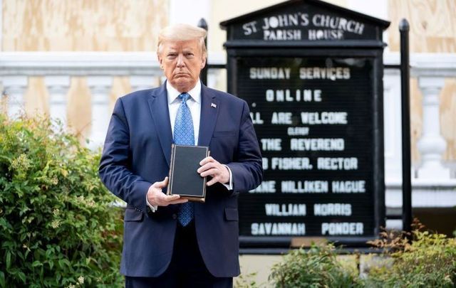 President Donald J. Trump poses outside of the boarded-up St. John’s Episcopal Church holding a bible on June 1, 2020 amid nationwide protests after the death of black man George Floyd.