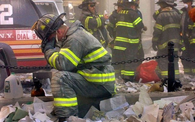 A member of the FDNY breaks down during the 9/11 attack on the World Trade Center. 