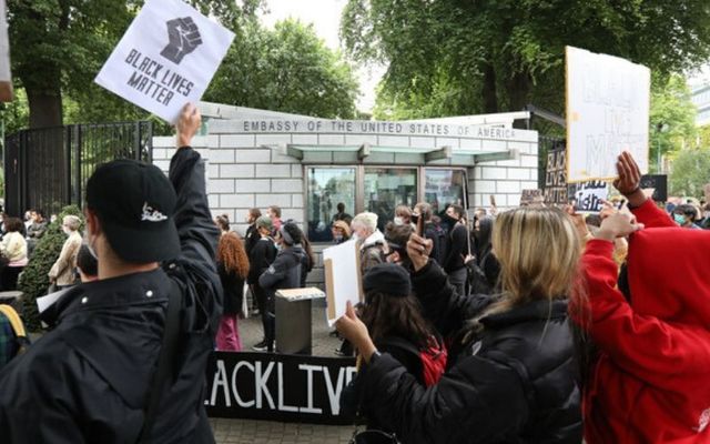 Protestors gather outside the US Embassy in Dublin. 