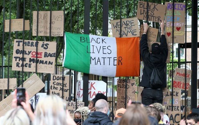 Crowds placed placards on the fence outside the United States of America Embassy in Dublin on June 6, 2020 to show their support for the Black Lives Matter movement, following the death of George Floyd in Minneapolis.
