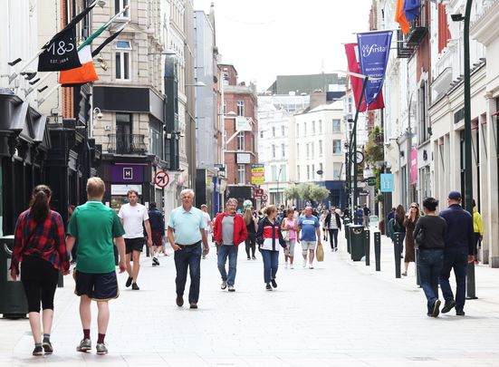 Grafton Street thronged with people as Irish government eases the COVID lockdown.