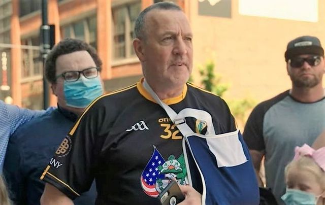 Malachy McAllister speaking with his supporters before he surrendered himself in New Jersey on June 9.