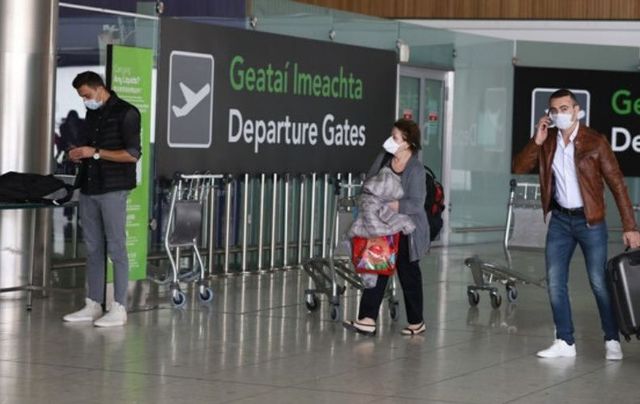 Passengers at Dublin Airport, where flights to the US have virtually halted.