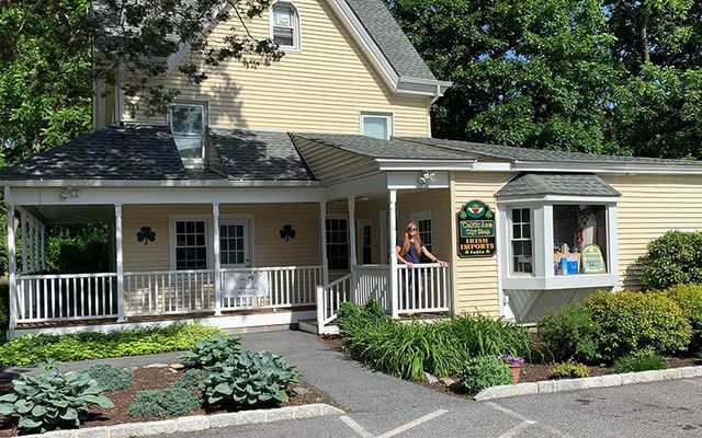 Ashley Rooney standing outside her Irish store, Celtic Aer gift shop.