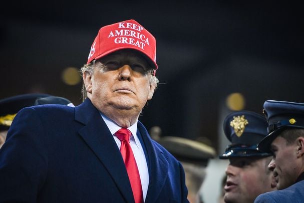 President Donald J Trump, wearing a \"Keep America Great\" hat.