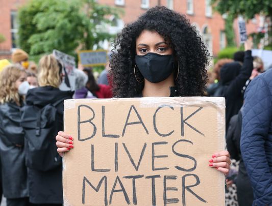 A protester at the Dublin Black Lives Matter protests in the wake of George Floyd\'s killing.